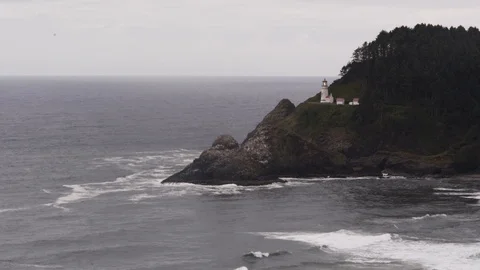 Oregon Light house along rugged coast Stock Footage 86130171