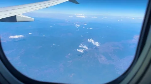 Oregon Mountains and Volcanic Landscape POV from Airplane Window Stock Footage 341992776