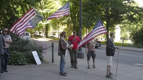 Oregon Standoff trial protesters holding flags Stock Footage 71798955