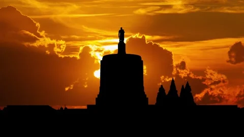 The Oregon State Capitol building at sunset, Time Lapse at Sunset with Red Sun Stock Footage 303998658