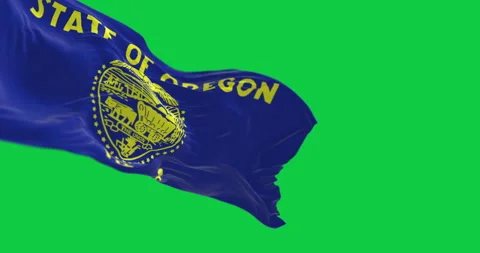 Oregon state flag waving isolated on green background Stock Footage 310447361
