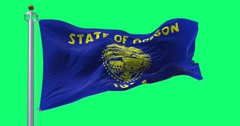 Oregon state flag waving in the wind isolated on green background Video stock 290007004