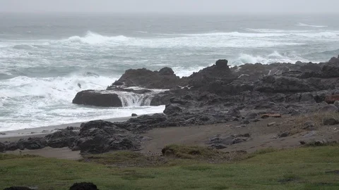 Oregon wild winter waves on rocks Stock Footage 97652881