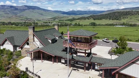 Oregon's rustic welcome center features stone chimneys and elevated timber Stock Footage 338319470