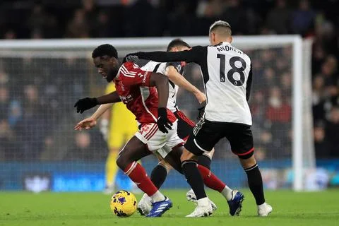  Orel Mangala of Nottingham Forest evades Andreas Pereira of Fulham during... Stock Photos