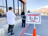Orem, Usa - April 2, 2020: Social Distancing Sign Outside Orem Utah Costco Stock Photos