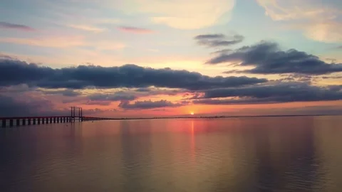 Oresund bridge view at sunset during summer in south of Sweden Stock Footage 136726150