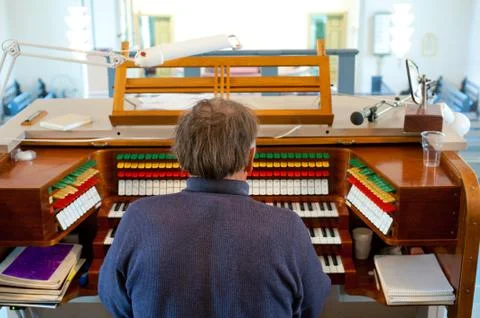 Organ player Stock Photos