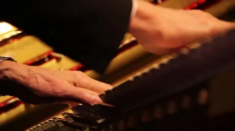 Organ playing below Vídeos de archivo 50984112