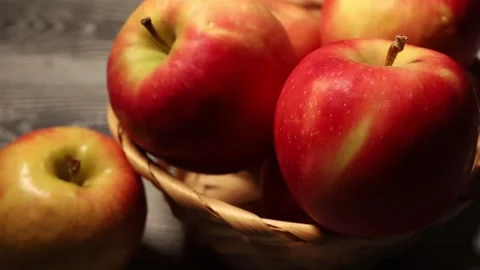Organic apples in a wicker basket Stock Footage 170774599