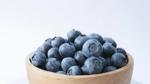 Organic blueberries in rustic bowl offer versatile studio composition Stock Footage 340410053