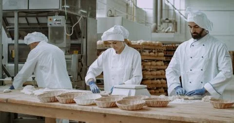 Organic bread processing of preparation in a big bakery factory details of a Stock Photos