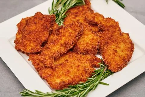 Organic breaded chicken cutlet Stock Photos