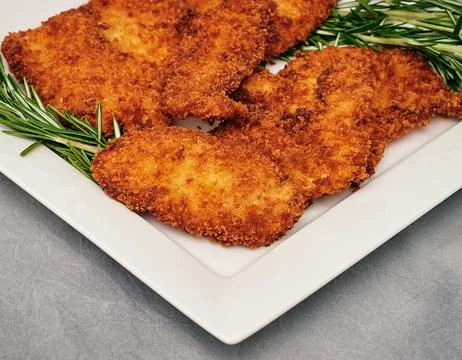 Organic breaded chicken cutlet Stock Photos