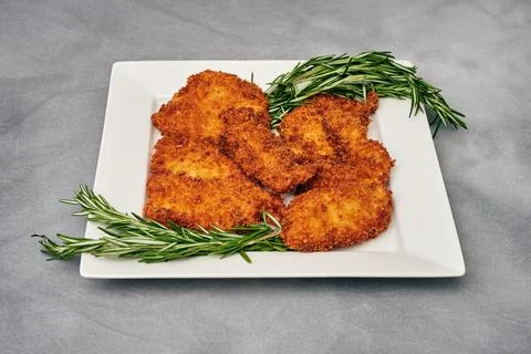 Organic breaded chicken cutlet Fotos Stock