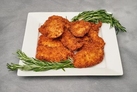 Organic breaded chicken cutlet Stock Photos