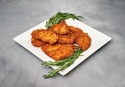 Organic breaded chicken cutlet Stock Photos