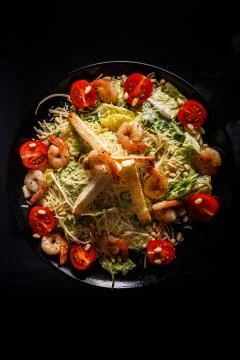 Organic caesar salad with caesar dressing. International food. Stock Photos