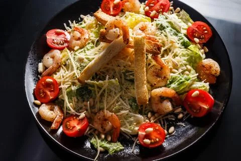 Organic caesar salad with caesar dressing. International food. Stock Photos