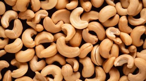 Organic Cashew Nuts Horizontal Background. Stock Illustration