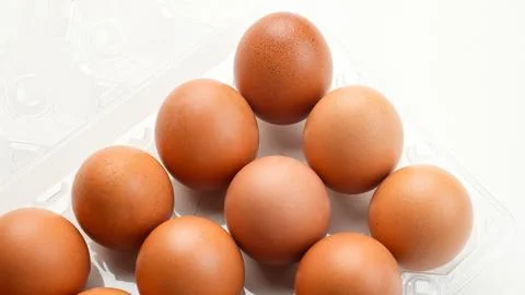 Organic chicken eggs in plastic packaging Stock Photos