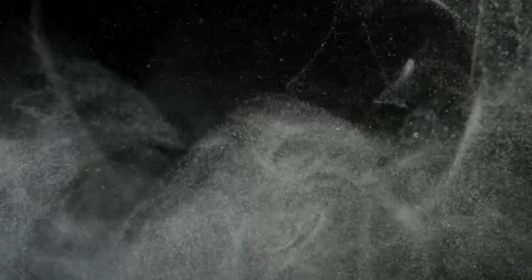 Organic cloud of dust particles floating on black screen overlay. Filmed with Stock-Footage 224641667