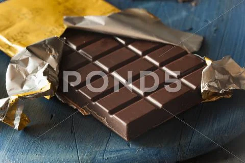 Organic dark chocolate candy bar Stock Photos