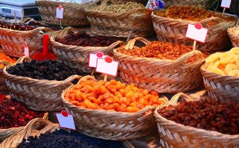 Organic different types of dried or candied fruits at a street market Stock Photos