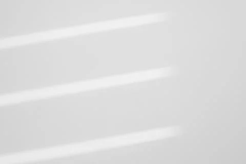 Organic drop shadow on a white wall Stock Photos