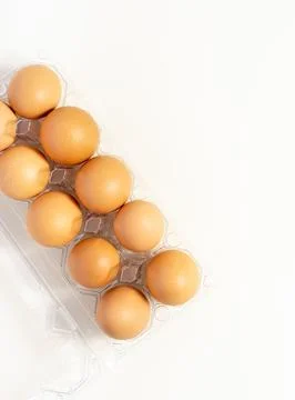 Organic Egg in Clear Pack Isolated on White. Top view. Place For Text. Stock Photos