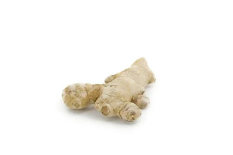 Organic ginger root on a clean white backdrop. Stock Photos