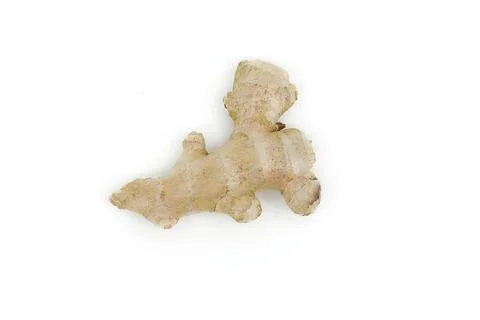 Organic ginger root isolated on bright white studio surface. Stock Photos