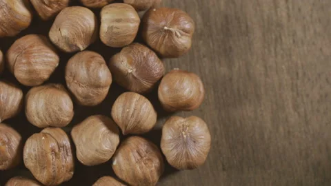 Organic hazelnuts loopable rotation video Stock Footage 90800860