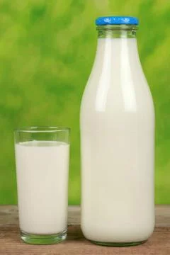 Organic milk in a bottle Stock Photos