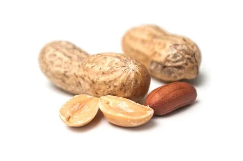 Organic peanuts on white background Stock Photos