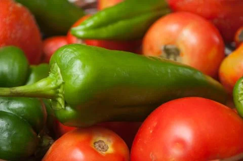 Organic peppers and tomatoes stack 스톡 사진