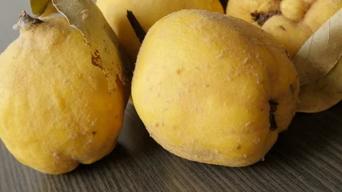 Organic quinces on the table close-up Stock Footage 83989787