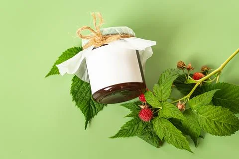 Organic raspberry jam packaging mockup with blank white label Stock Photos