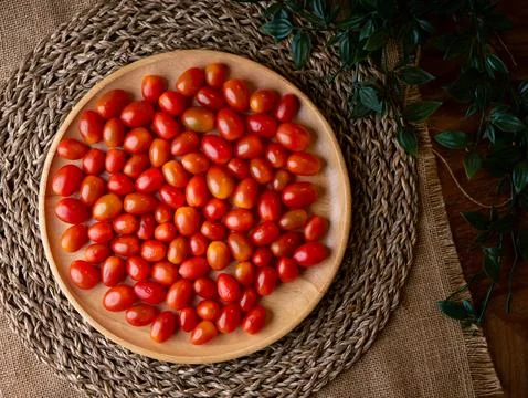 Organic Red grape cherry tomato. fresh vegetables. copy space. Stock Photos