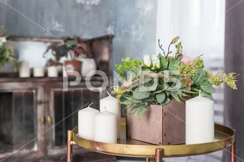 Organic scented soy candle on small table. Loft interior decor, minimalism Stock Photos