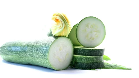 Organic summer squash with blossoms on minimal white studio background Stock Footage 340415933