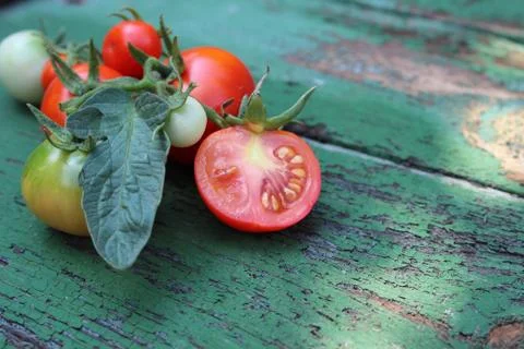 Organic tomatoes on the boards Stock Photos