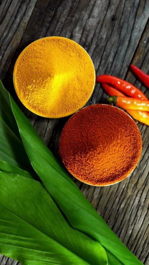 Organic Turmeric Roots Placed On Rustic Wooden Surface Video stock 331763863