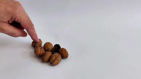 Organic Walnuts Arranged on White- Simple, Clean Food Composition Video stock 320098148