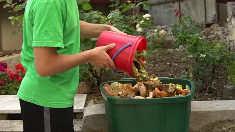 Organic waste container. Waste sorting. Vegetable, fruit and garden waste Stock Footage 137173718