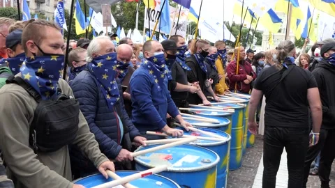 An organization of drummers listens to the speech of the Leader of the rally. Stock Footage 134635159