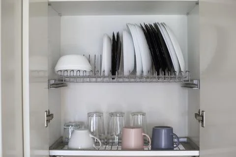 Organization for small spaces. Kitchen organization. Stock Photos