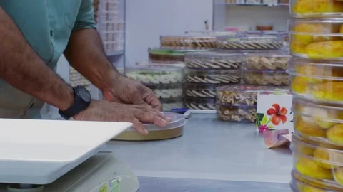 Organized bakery kitchen counter with containers, jars, ingredients 動画素材 337481835