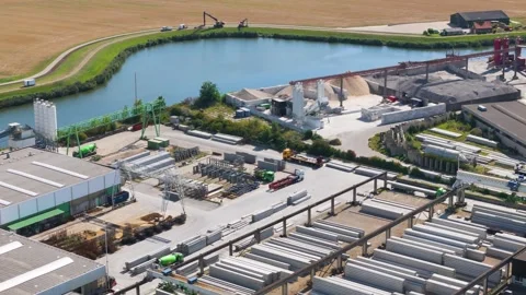 Organized industrial yard stacked materials heavy machinery conveyor systems Stock Footage 327946589