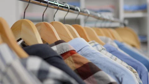 Organized interior, a huge selection of clothes hang hangers with things. Ra Stock Footage 242532511